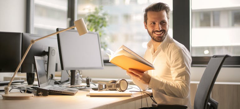 a man in the office thinking about how to build emotional connections with your customers