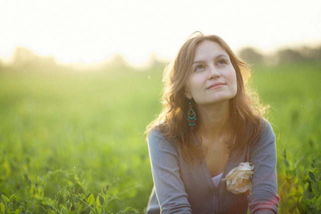 Person sitting in a field