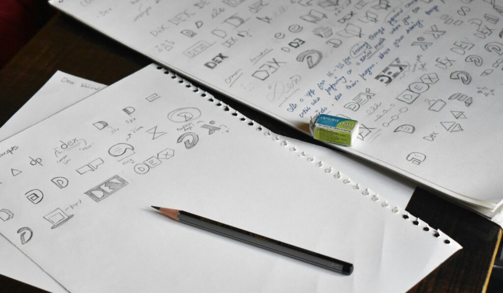 Pencil sketch a logo, representing a human design process in the AI era